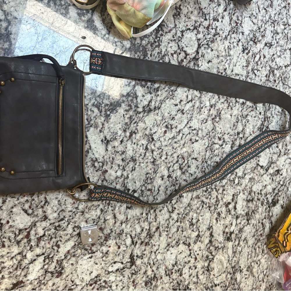 Stylish Black Crossbody Bag with Embellished Strap